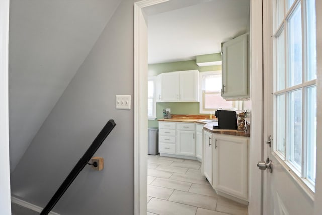 29687 Westfield St, Livonia, MI 48150 - kitchen with white cabinetry and light tile patterned flooring