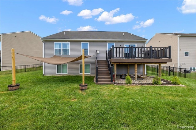 58565 Westmoore Cir, New Haven, MI 48048 - back of property featuring stairway, a wooden deck, and a fenced backyard