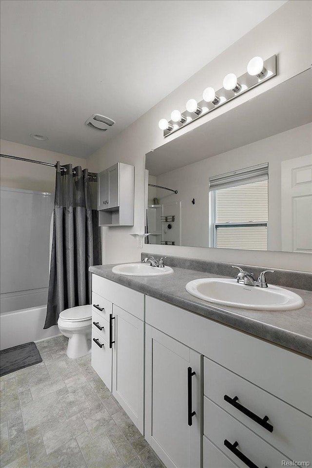58565 Westmoore Cir, New Haven, MI 48048 - bathroom featuring double vanity and shower / tub combo