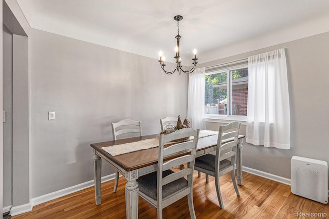 1820 W Longmeadow Rd, Trenton, MI 48183 - dining space with a chandelier and wood finished floors