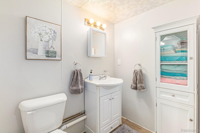 1820 W Longmeadow Rd, Trenton, MI 48183 - half bathroom with vanity and wood finished floors