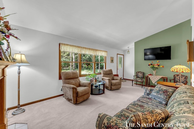 15071 Steves Dr, Grand Haven, MI 49417 - carpeted living room with lofted ceiling and baseboards