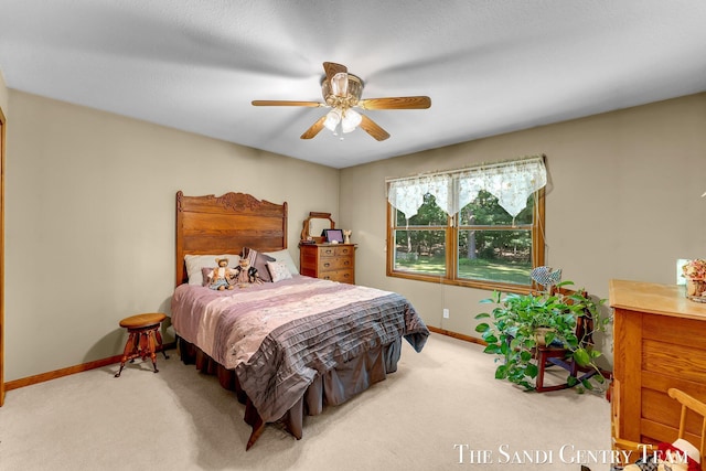 15071 Steves Dr, Grand Haven, MI 49417 - carpeted bedroom featuring baseboards and ceiling fan