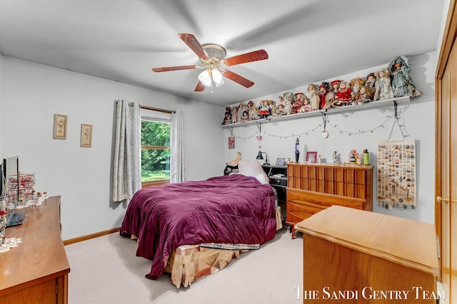 15071 Steves Dr, Grand Haven, MI 49417 - carpeted bedroom featuring ceiling fan and baseboards