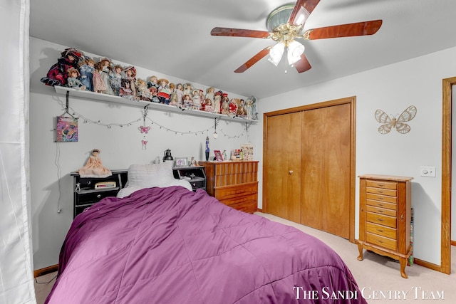 15071 Steves Dr, Grand Haven, MI 49417 - carpeted bedroom featuring a closet and a ceiling fan
