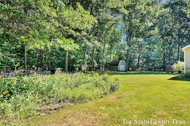 15071 Steves Dr, Grand Haven, MI 49417 - view of green lawn featuring a shed