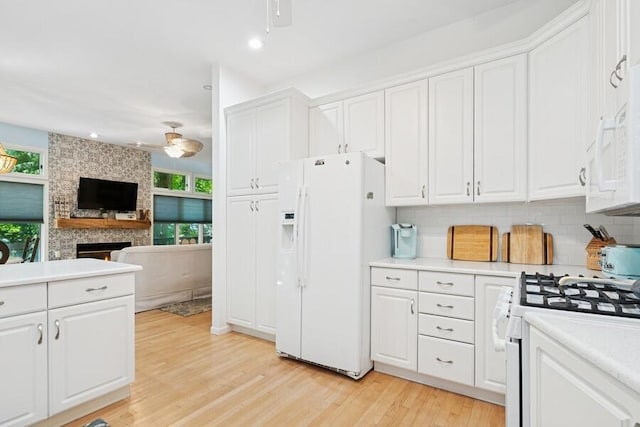 613 Indian Trl, Sawyer, MI 49125 - kitchen with white appliances, a ceiling fan, white cabinetry, and recessed lighting