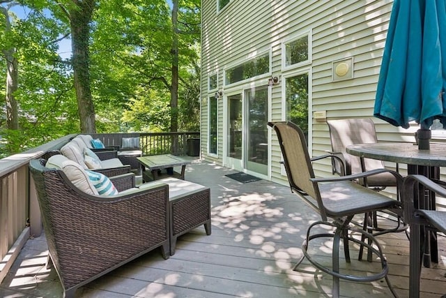 613 Indian Trl, Sawyer, MI 49125 - wooden deck featuring outdoor lounge area and outdoor dining area