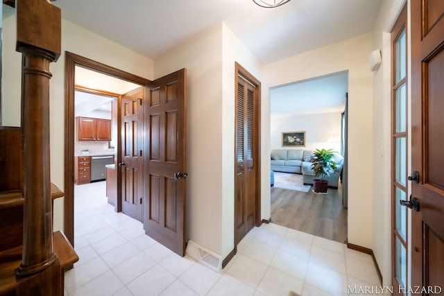 2934 Meadowbrook Dr SE, Grand Rapids, MI 49546 - hall with light tile patterned floors