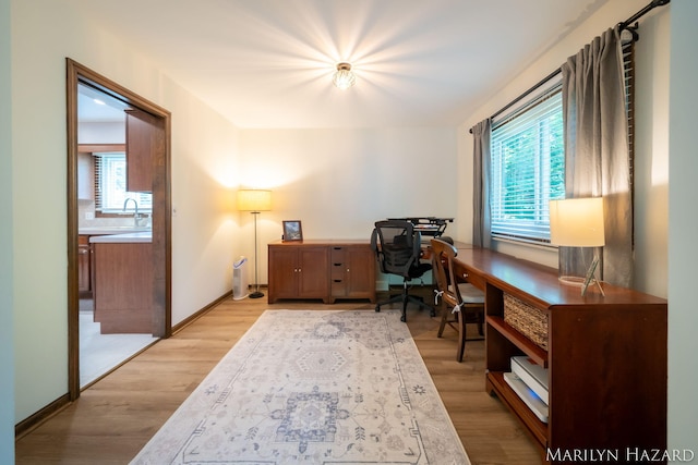 2934 Meadowbrook Dr SE, Grand Rapids, MI 49546 - office space featuring light wood finished floors and baseboards