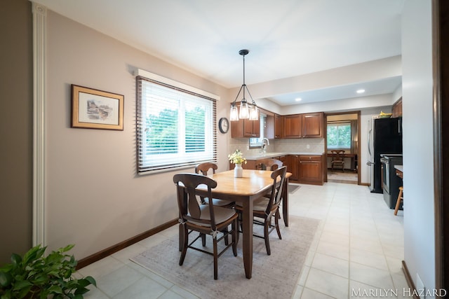 2934 Meadowbrook Dr SE, Grand Rapids, MI 49546 - dining area featuring baseboards and recessed lighting