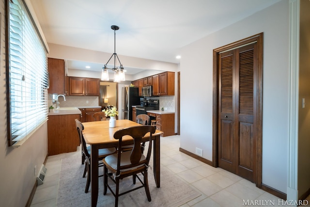 2934 Meadowbrook Dr SE, Grand Rapids, MI 49546 - dining space with light tile patterned flooring and recessed lighting