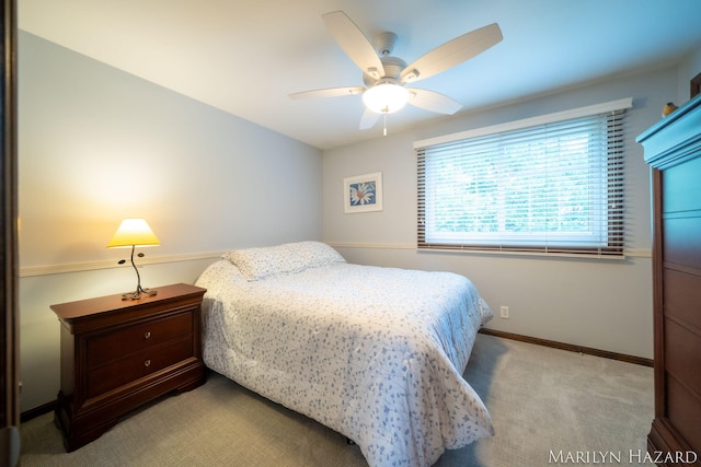 2934 Meadowbrook Dr SE, Grand Rapids, MI 49546 - bedroom featuring light carpet and a ceiling fan