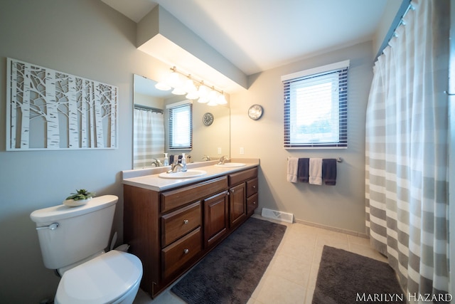 2934 Meadowbrook Dr SE, Grand Rapids, MI 49546 - bathroom featuring double vanity and tile patterned floors