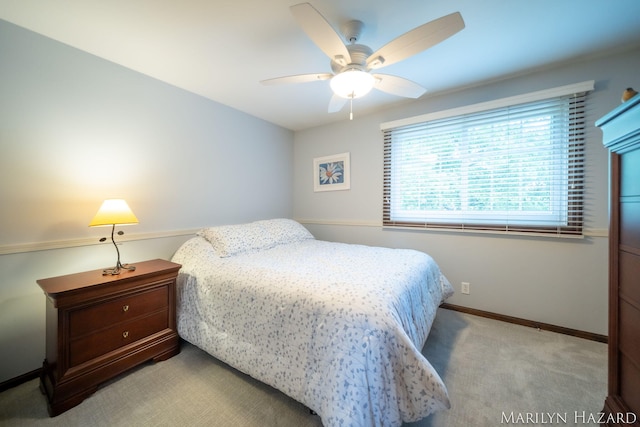 2934 Meadowbrook Dr SE, Grand Rapids, MI 49546 - carpeted bedroom with baseboards and ceiling fan