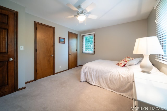 2934 Meadowbrook Dr SE, Grand Rapids, MI 49546 - bedroom featuring light colored carpet and a ceiling fan