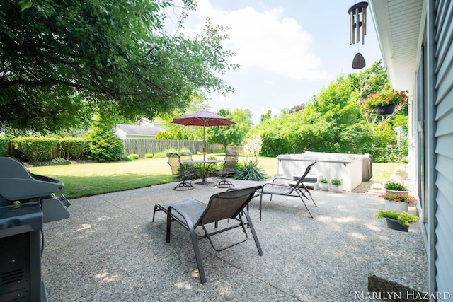 2934 Meadowbrook Dr SE, Grand Rapids, MI 49546 - fenced backyard with outdoor dining area, a patio area, and grilling area