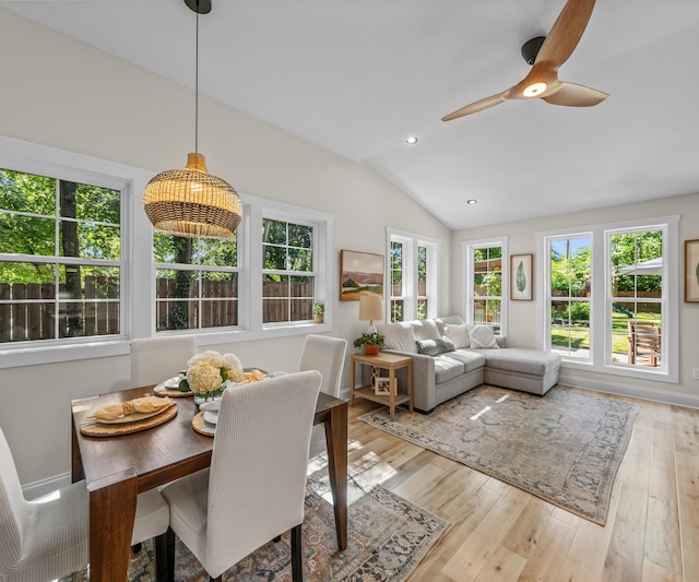 820 Barton Dr, Ann Arbor, MI 48105 - dining space featuring healthy amount of natural light, vaulted ceiling, light wood-type flooring, a ceiling fan, and recessed lighting
