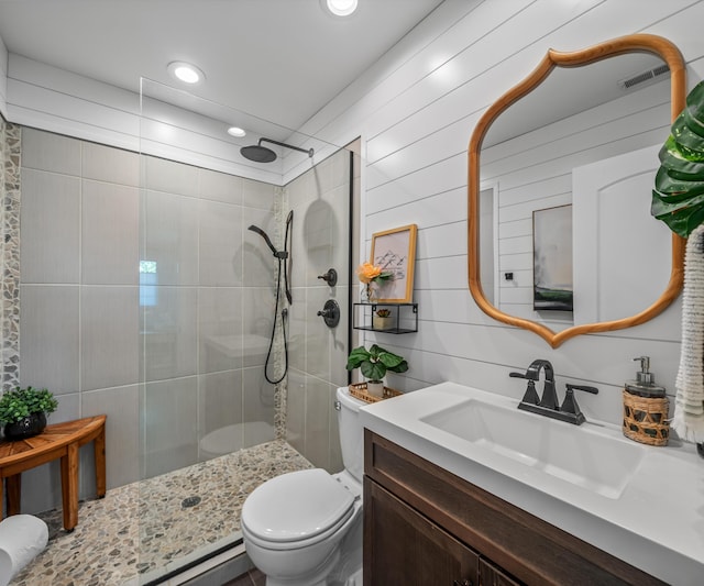 820 Barton Dr, Ann Arbor, MI 48105 - full bathroom featuring vanity, a walk in shower, and recessed lighting