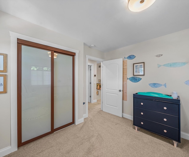 820 Barton Dr, Ann Arbor, MI 48105 - bedroom with light colored carpet and a closet