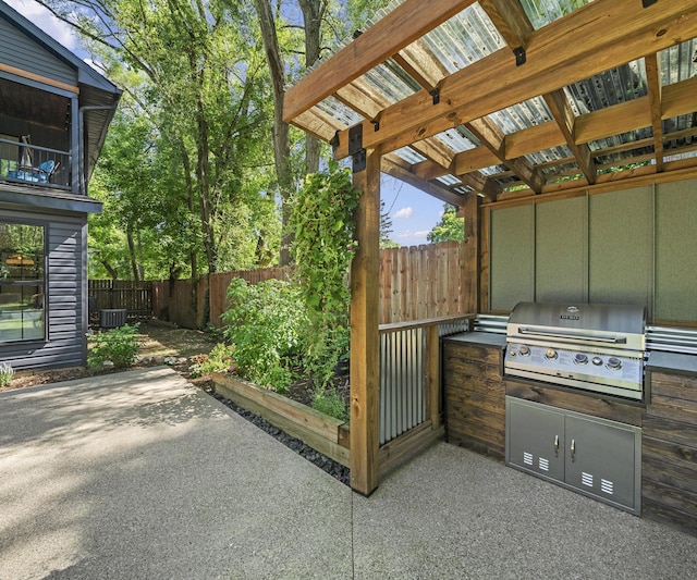 820 Barton Dr, Ann Arbor, MI 48105 - fenced backyard featuring a patio and area for grilling