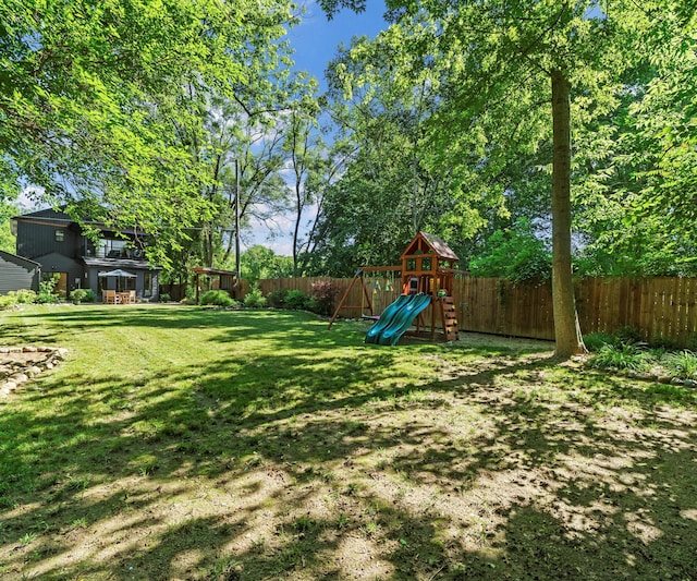 820 Barton Dr, Ann Arbor, MI 48105 - fenced backyard featuring a playground