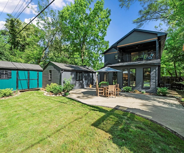 820 Barton Dr, Ann Arbor, MI 48105 - back of house featuring a balcony, a patio, and a shed