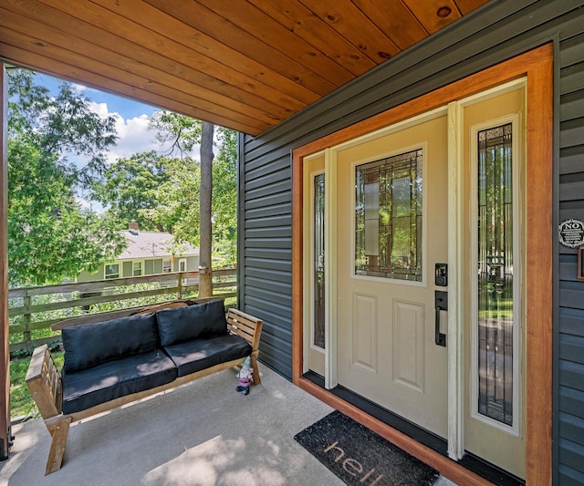 820 Barton Dr, Ann Arbor, MI 48105 - view of exterior entry featuring outdoor lounge area