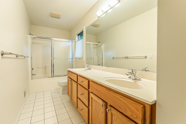 1544 Newport Creek Dr, Ann Arbor, MI 48103 - full bath featuring double vanity, tile patterned flooring, and shower / bath combination with glass door