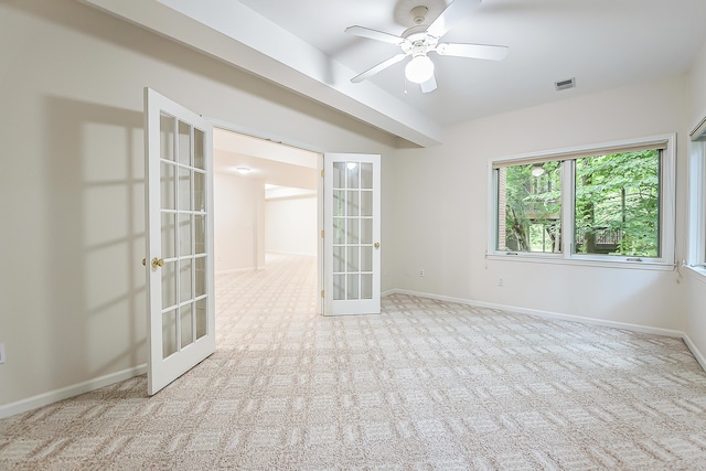 1544 Newport Creek Dr, Ann Arbor, MI 48103 - carpeted empty room with french doors and a ceiling fan