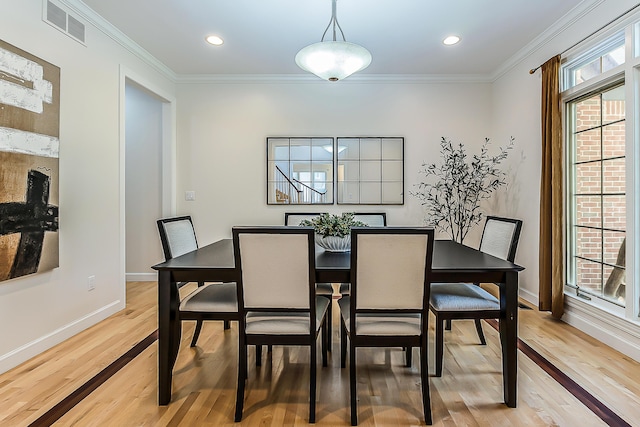 1544 Newport Creek Dr, Ann Arbor, MI 48103 - dining area with light wood-style floors, crown molding, and recessed lighting