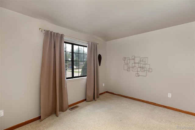 5419 Duke Ct, Warren, MI 48091 - spare room with baseboards and light colored carpet