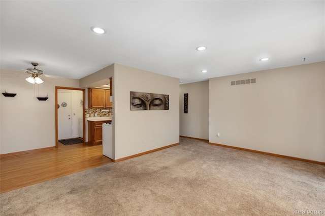 5419 Duke Ct, Warren, MI 48091 - unfurnished living room with light colored carpet, recessed lighting, and ceiling fan