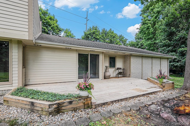 36680 Howard Rd, Farmington, MI 48331 - rear view of house with a wooden deck