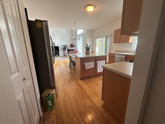 33555 Birchlawn, Westland, MI 48185 - kitchen with stainless steel appliances, light wood-style floors, a chandelier, a kitchen island, and light countertops