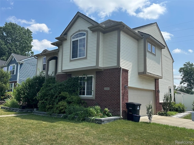 33555 Birchlawn, Westland, MI 48185 - view of home's exterior featuring brick siding, a garage, and concrete driveway