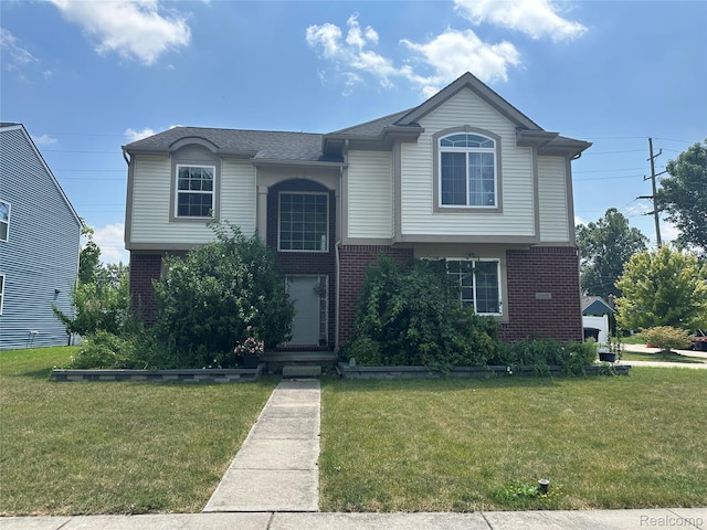 33555 Birchlawn, Westland, MI 48185 - view of front of home with brick siding and a front yard