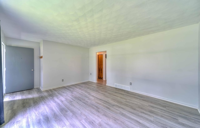 2922-2926 Chapel Rd, Parma, MI 49269 - spare room featuring wood finished floors