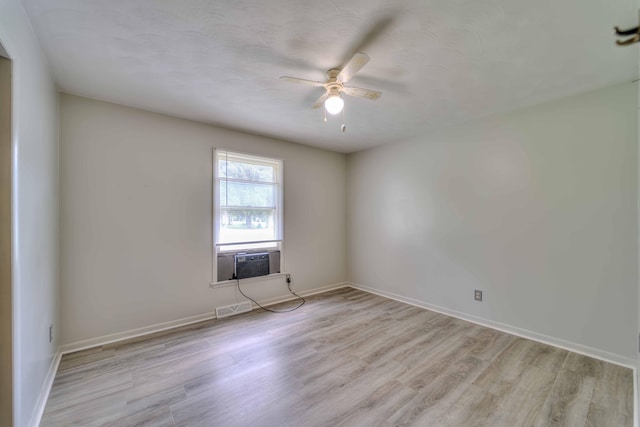 2922-2926 Chapel Rd, Parma, MI 49269 - empty room featuring light wood-style flooring, ceiling fan, and cooling unit
