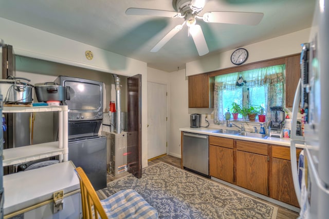2922-2926 Chapel Rd, Parma, MI 49269 - kitchen featuring dishwasher, freestanding refrigerator, ceiling fan, brown cabinets, and light countertops