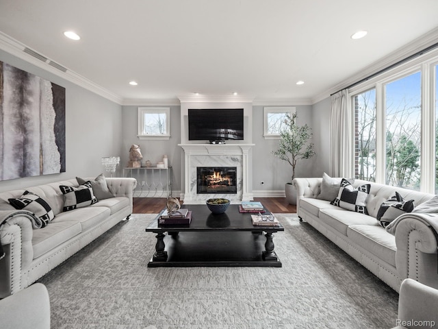 1200 Shipman Blvd, Birmingham, MI 48009 - living room featuring wood finished floors, a fireplace, ornamental molding, and recessed lighting