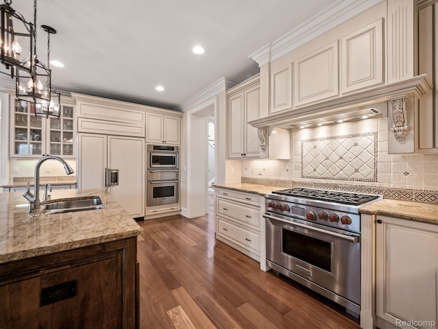 1200 Shipman Blvd, Birmingham, MI 48009 - kitchen featuring premium appliances, cream cabinets, light stone counters, backsplash, and recessed lighting