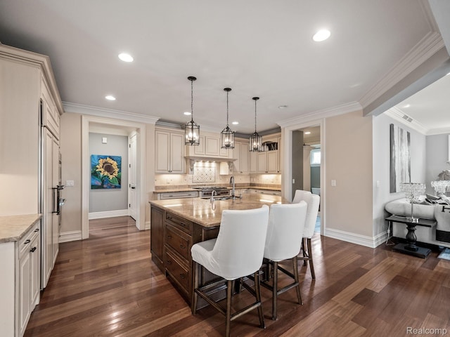 1200 Shipman Blvd, Birmingham, MI 48009 - kitchen featuring recessed lighting, a kitchen bar, dark wood-style flooring, decorative backsplash, and light stone counters