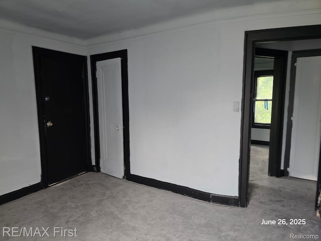 9379 Manor St, Detroit, MI 48204 - carpeted spare room with baseboards and crown molding