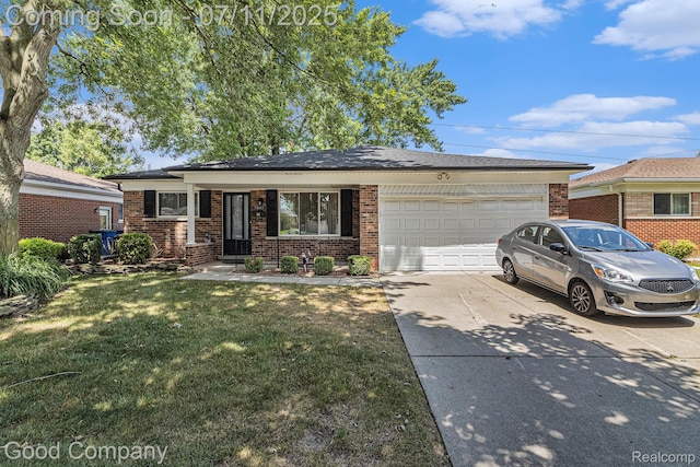 3847 Dwight Dr, Warren, MI 48092 - view of front of house with a garage, brick siding, driveway, and a front yard