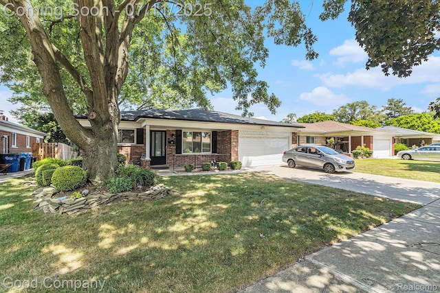 3847 Dwight Dr, Warren, MI 48092 - ranch-style home with brick siding, concrete driveway, and a garage