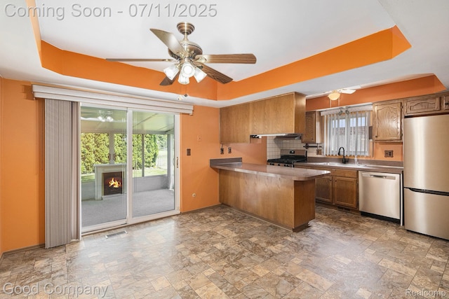 3847 Dwight Dr, Warren, MI 48092 - kitchen featuring stainless steel appliances, ceiling fan, and stone finish flooring