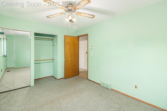 3847 Dwight Dr, Warren, MI 48092 - unfurnished bedroom with two closets, carpet floors, and ceiling fan