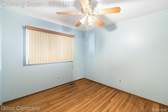 3847 Dwight Dr, Warren, MI 48092 - empty room with wood finished floors and ceiling fan