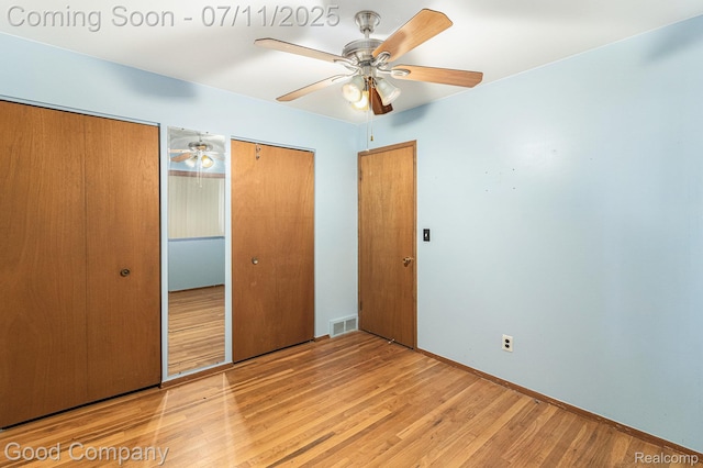 3847 Dwight Dr, Warren, MI 48092 - unfurnished bedroom featuring wood finished floors and a ceiling fan